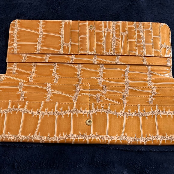 Big Buddha clutch, like new, from pet free home. Used maybe twice. - Picture 6 of 6